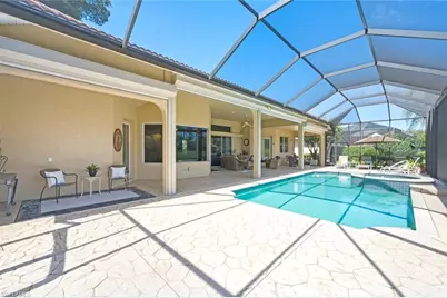 5872 Whisperwood Ct, Naples, FL 34110 - Photo 22