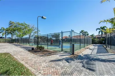 5872 Whisperwood Ct, Naples, FL 34110 - Photo 46