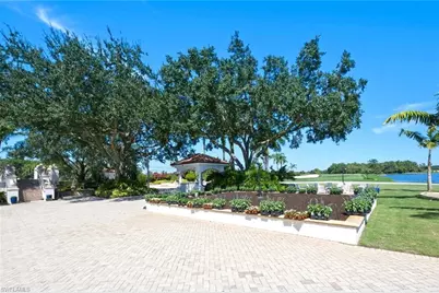 5872 Whisperwood Ct, Naples, FL 34110 - Photo 42