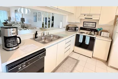 6945 Dennis Cir #i206, Naples, FL 34104 - Photo 10