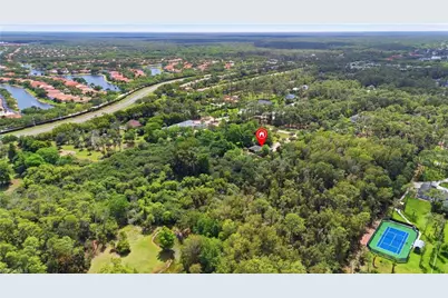 5681 Bur Oaks Ln, Naples, FL 34119 - Photo 4