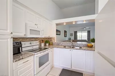 475 Robin Hood Cir #202, Naples, FL 34104 - Photo 10