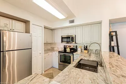 1230 Wildwood Lakes Blvd #202, Naples, FL 34104 - Photo 12
