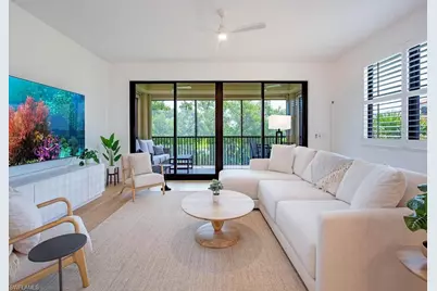 7040 Pelican Bay Blvd #D302, Naples, FL 34108 - Photo 1