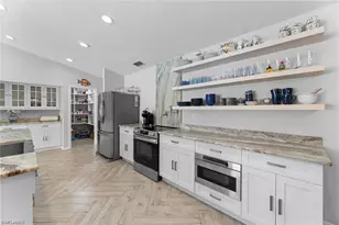 2467 Pinewoods Cir, Naples, FL 34105 - Photo 22