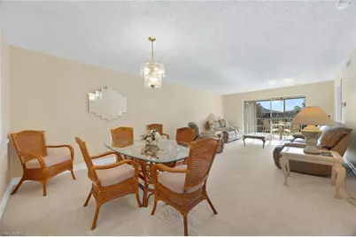 5683 Rattlesnake Hammock Rd #A-202, Naples, FL 34113 - Photo 4