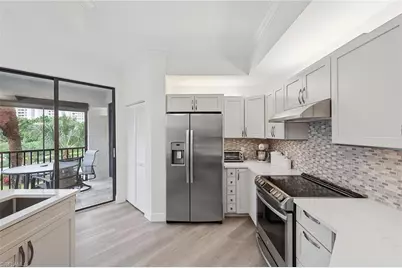 7024 Pelican Bay Blvd #201, Naples, FL 34108 - Photo 16
