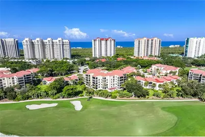 7024 Pelican Bay Blvd #201, Naples, FL 34108 - Photo 1