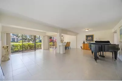 576 Retreat Dr #101, Naples, FL 34110 - Photo 2