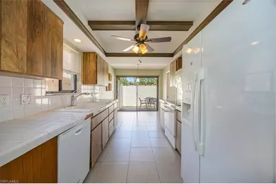 576 Retreat Dr #101, Naples, FL 34110 - Photo 6