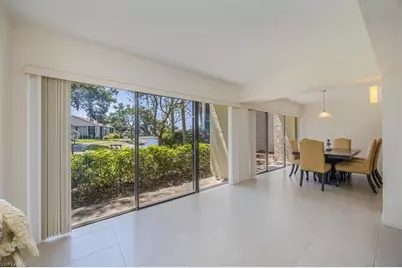 576 Retreat Dr #101, Naples, FL 34110 - Photo 4