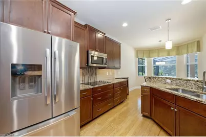 7747 Martino Cir, Naples, FL 34112 - Photo 8