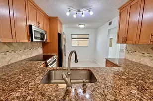661 Squire Cir, Naples, FL 34104 - Photo 1