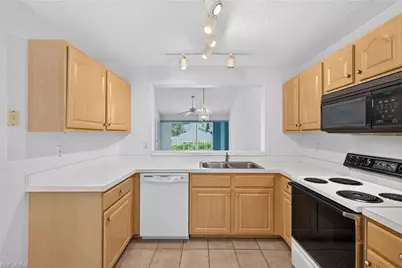 768 Landover Cir #203, Naples, FL 34104 - Photo 4