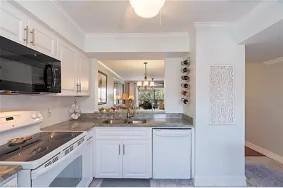 1075 Foxfire Ln #310, Naples, FL 34104 - Photo 2