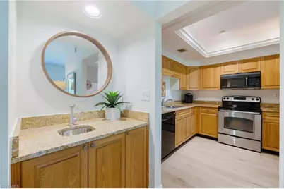 6760 Pelican Bay Blvd #315, Naples, FL 34108 - Photo 4