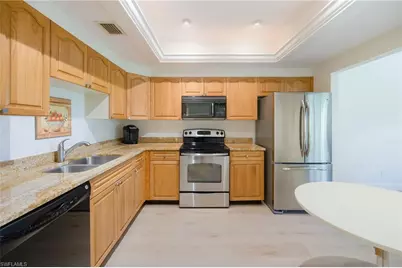 6760 Pelican Bay Blvd #315, Naples, FL 34108 - Photo 8