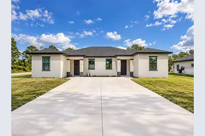 1103/1105 Dean St E, Lehigh Acres, FL 33974 - Photo 1