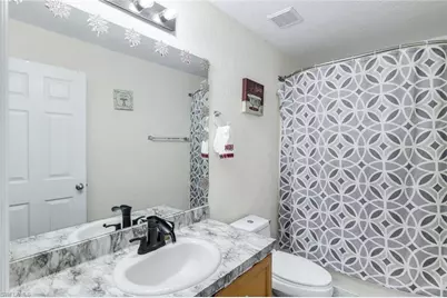 438 Willowbrook Dr, Lehigh Acres, FL 33972 - Photo 18