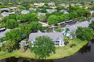 153 Wading Bird Cir, Naples, FL 34110 - Photo 2
