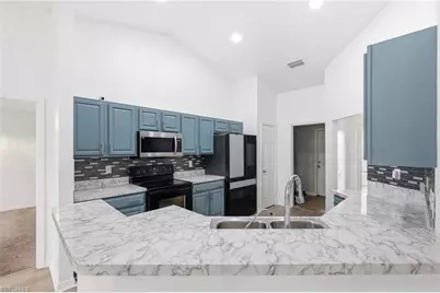 2009 NE 13th Pl, Cape Coral, FL 33909 - Photo 8