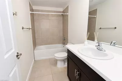 15449 Wildflower Cir, Naples, FL 34119 - Photo 14