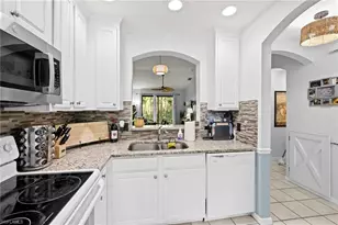 7715 Woodbrook Cir, Naples, FL 34104 - Photo 4