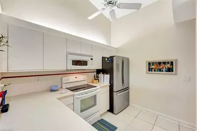7654 Pebble Creek Cir #303, Naples, FL 34108 - Photo 16