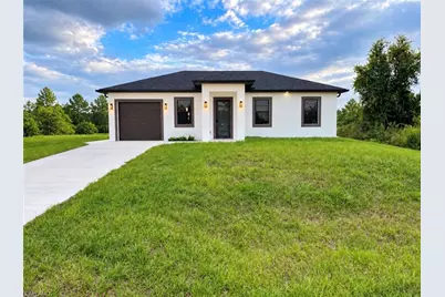 54 Floyd Ave S, Lehigh Acres, FL 33976 - Photo 1