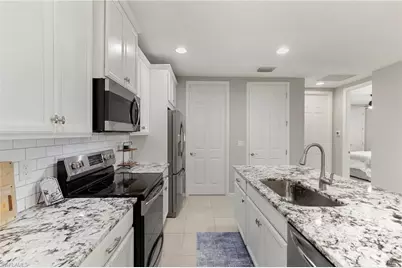 14731 Edgewater Cir, Naples, FL 34114 - Photo 44
