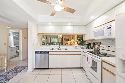 7380 Saint Ives Way NW #1202, Naples, FL 34104 - Photo 12