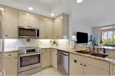 430 Cove Tower Dr #303, Naples, FL 34110 - Photo 4