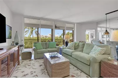430 Cove Tower Dr #303, Naples, FL 34110 - Photo 1