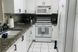57 Silver Oaks Cir, Naples, FL 34119 - Photo 12
