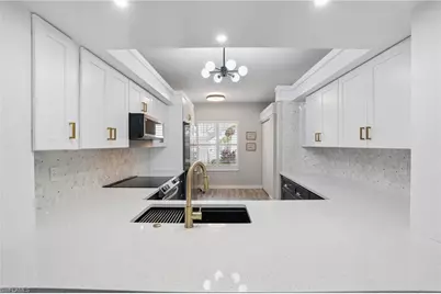 1220 Sarah Jean Cir #103, Naples, FL 34110 - Photo 2