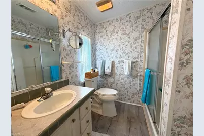 4700 Sawmill Dr W, Estero, FL 33928 - Photo 18