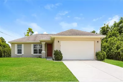 104 Zona Ave N, Lehigh Acres, FL 33971 - Photo 1