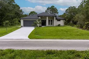 607 McArthur Ave, Lehigh Acres, FL 33936 - Photo 1