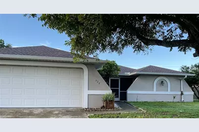 324 NE 7th St, Cape Coral, FL 33909 - Photo 1