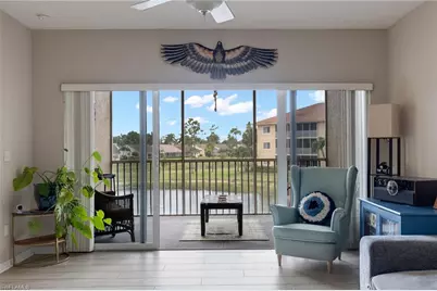 10020 Maddox Ln #211, Bonita Springs, FL 34135 - Photo 1