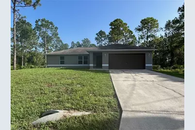704 W 17th St, Lehigh Acres, FL 33972 - Photo 1