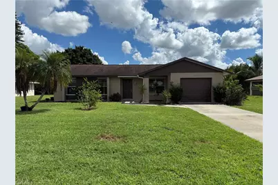 111 Richmond Ave S, Lehigh Acres, FL 33936 - Photo 1