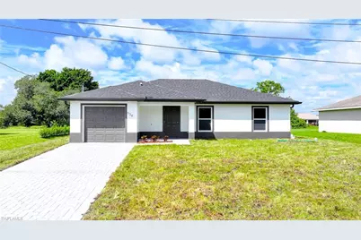 921 Sterling St E, Lehigh Acres, FL 33974 - Photo 1