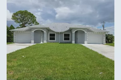 397 Carrillon Ave S, Lehigh Acres, FL 33974 - Photo 1