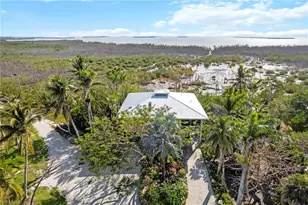 7377 Pineland Rd, Bokeelia, FL 33922 - Photo 1