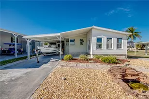 7306 Cobiac Dr, Saint James City, FL 33956 - Photo 1