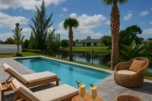1907 NE 34th Terrace, Cape Coral, FL 33909 - Photo 1