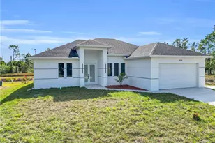 1040 Pine Cove Dr, Lehigh Acres, FL 33974 - Photo 1