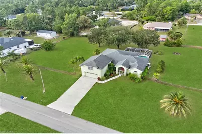 715 Plumosa Ave, Lehigh Acres, FL 33972 - Photo 1