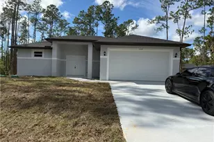 106 Moore Ave S, Lehigh Acres, FL 33974 - Photo 1